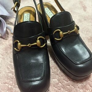 Gucci Black Leather Loafers with Gold Accents